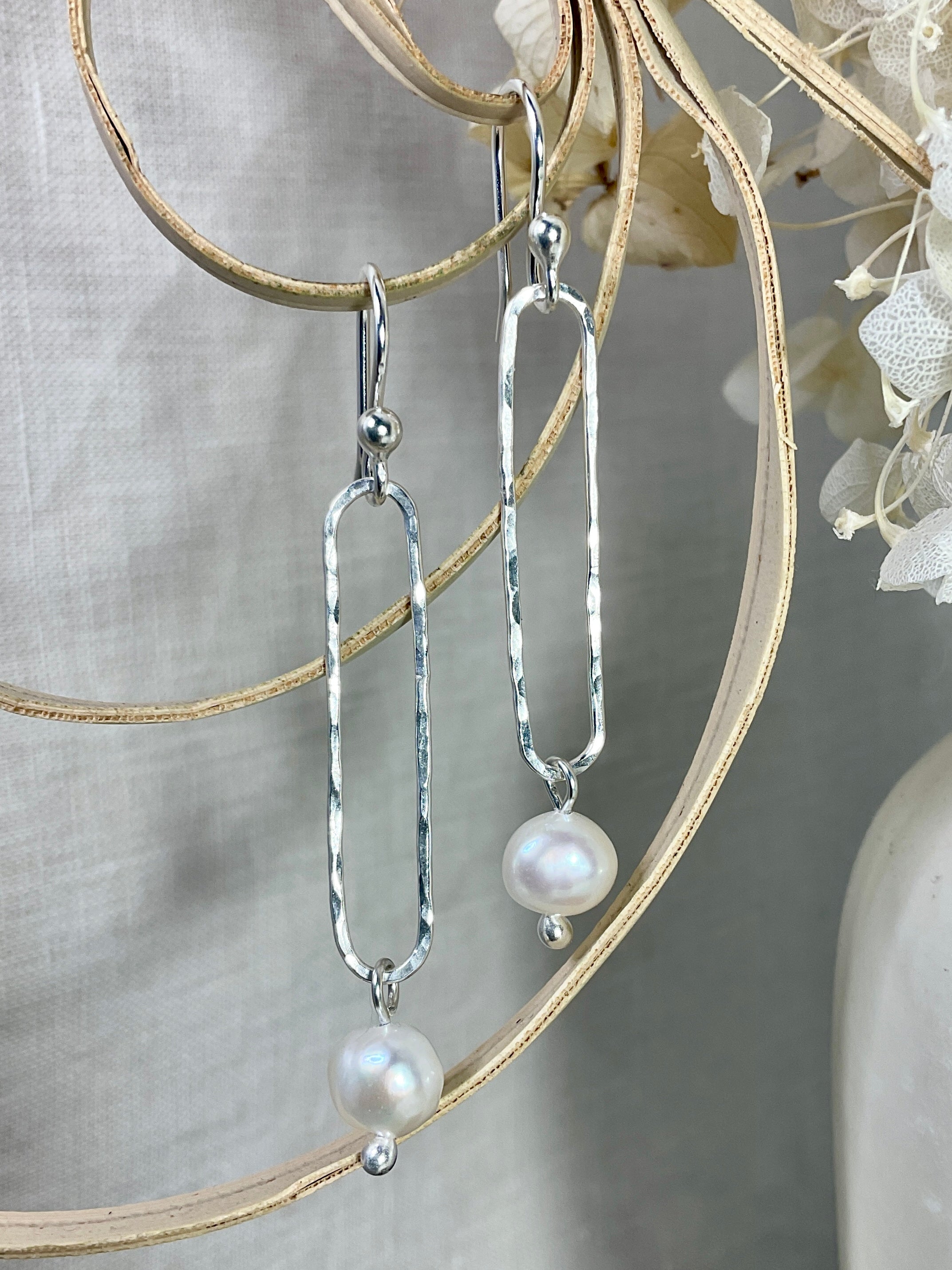 Pearl and Argentium silver earrings.