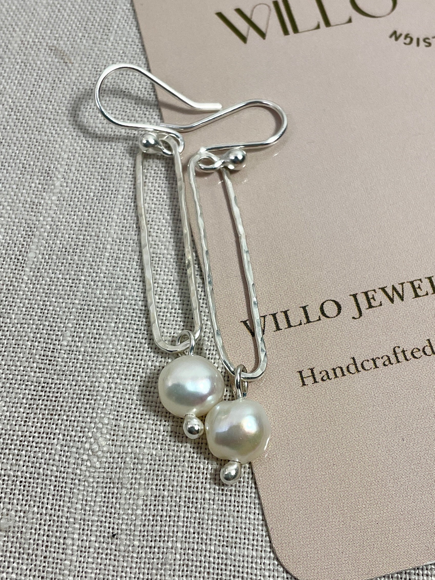 Pearl and Argentium silver earrings.