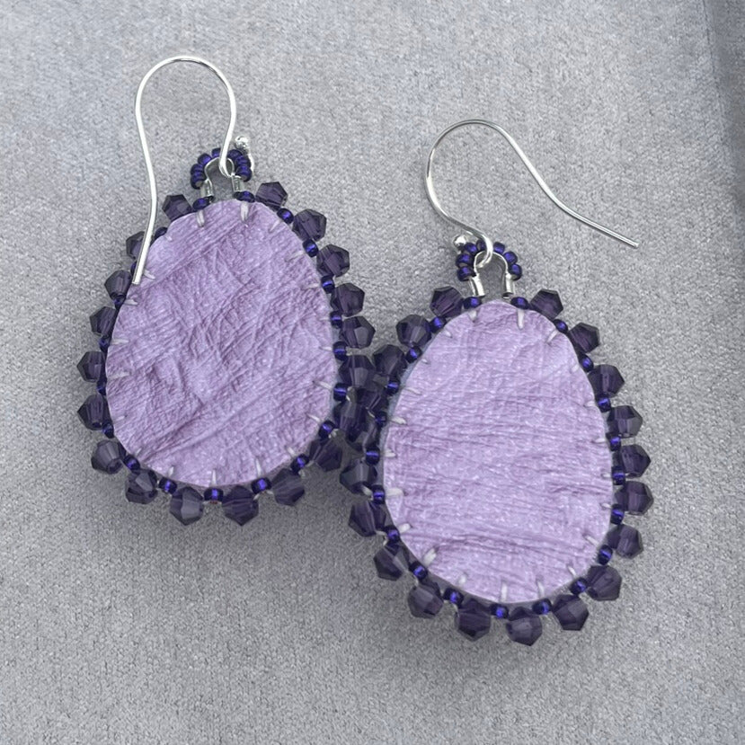 Eye-catching statement hand beaded earrings in purple and silver