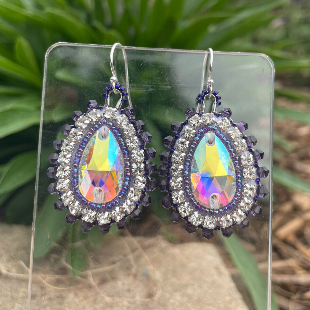 Eye-catching statement hand beaded earrings in purple and silver