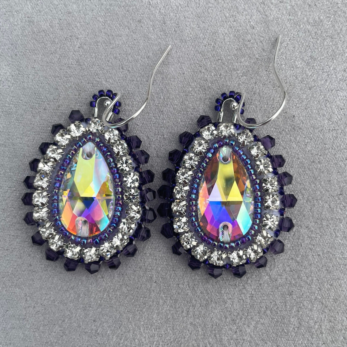 Eye-catching statement hand beaded earrings in purple and silver