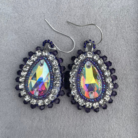 Eye-catching statement hand beaded earrings in purple and silver