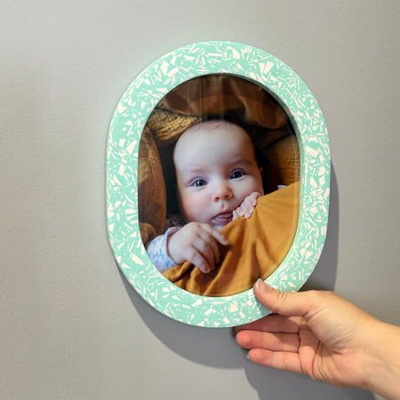 Bright turquoise & white terrazzo oval wall hanging photo frame