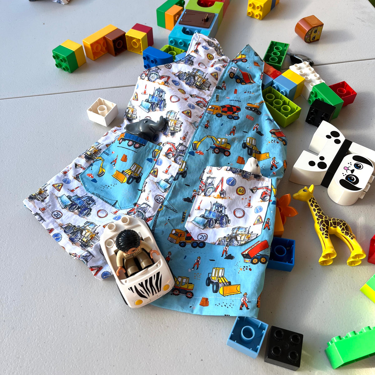baby overalls/shorts | construction trucks