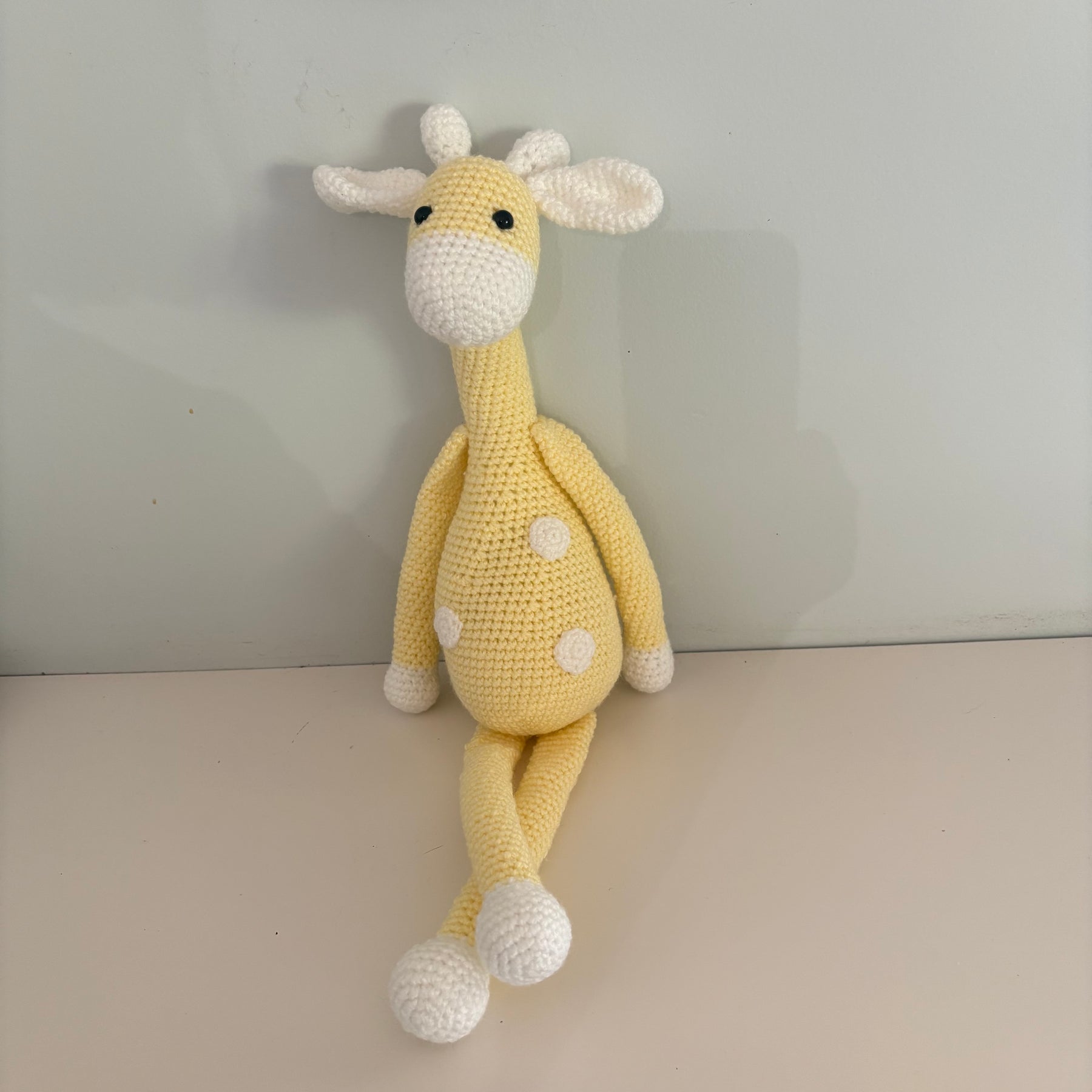 Long legged goofy giraffe crochet soft toy