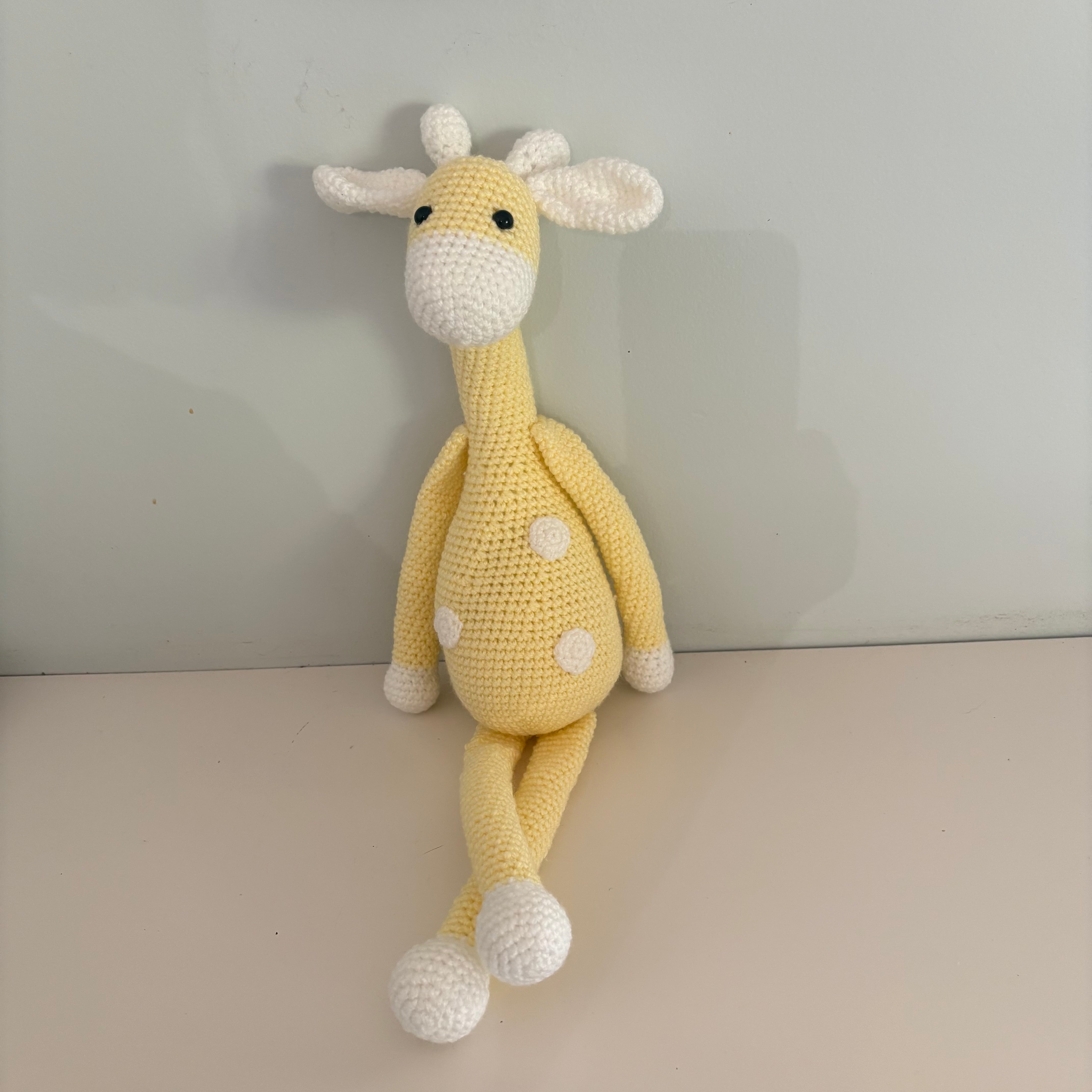 Long legged goofy giraffe crochet soft toy