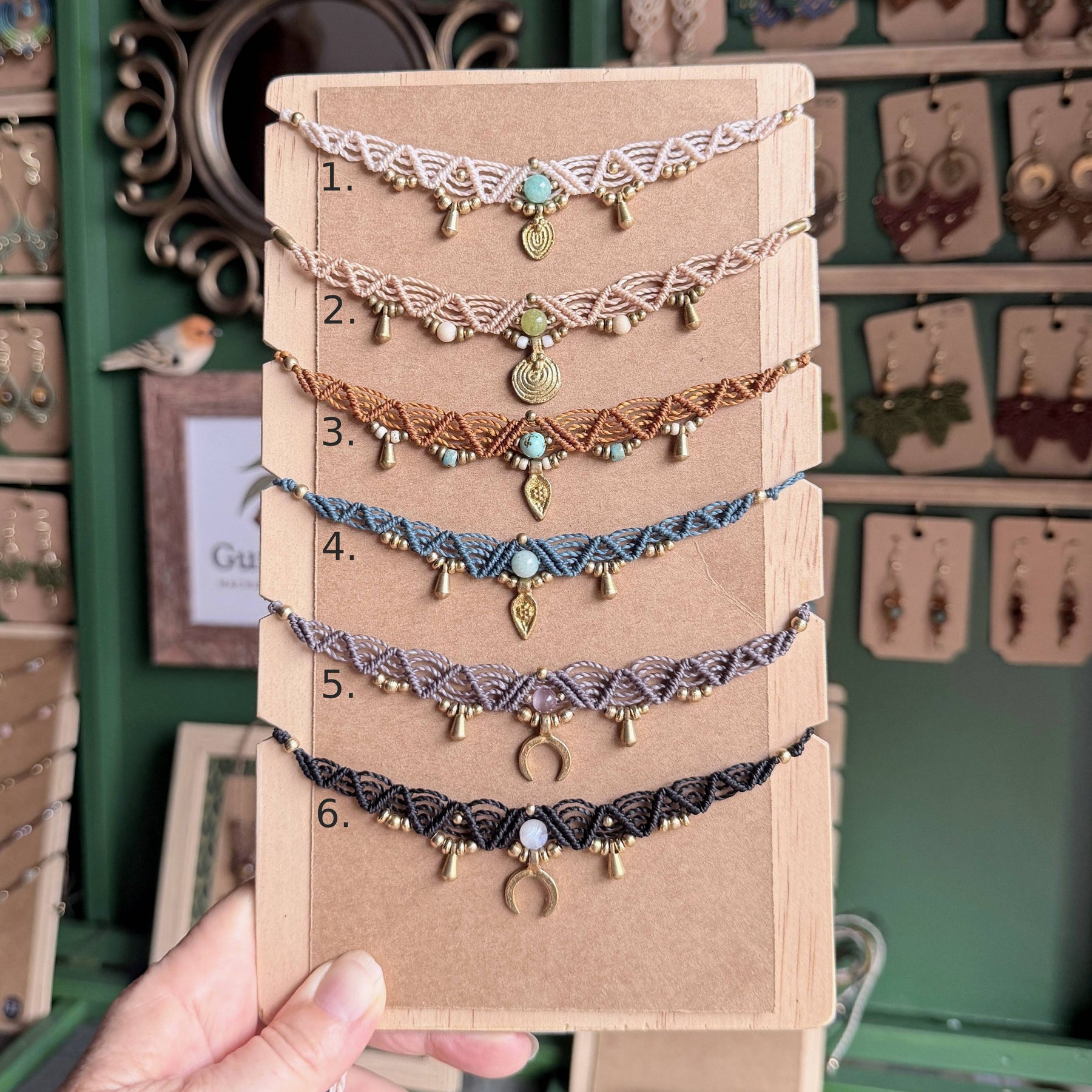 Macrame Boho Collier with gemstone bead and brass charms.