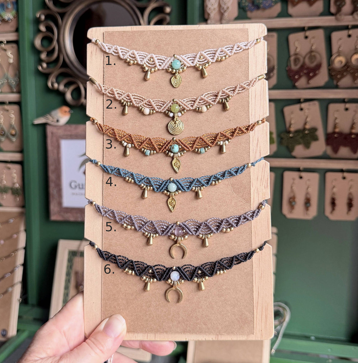 Macrame Boho Collier with gemstone bead and brass charms.