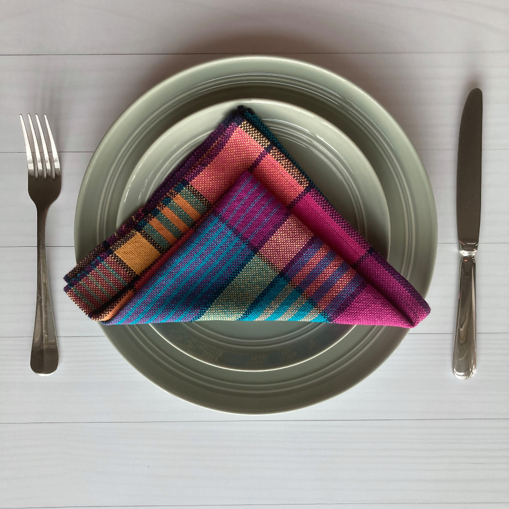 On-plate-napkin-folded-handwoven-entangled-happiness-handwovens