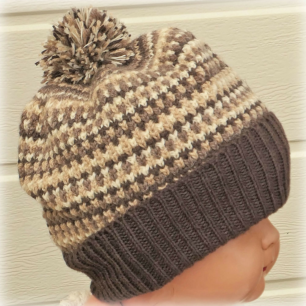 Child's beanie in brown/fawn tones. Hand made. Free post.