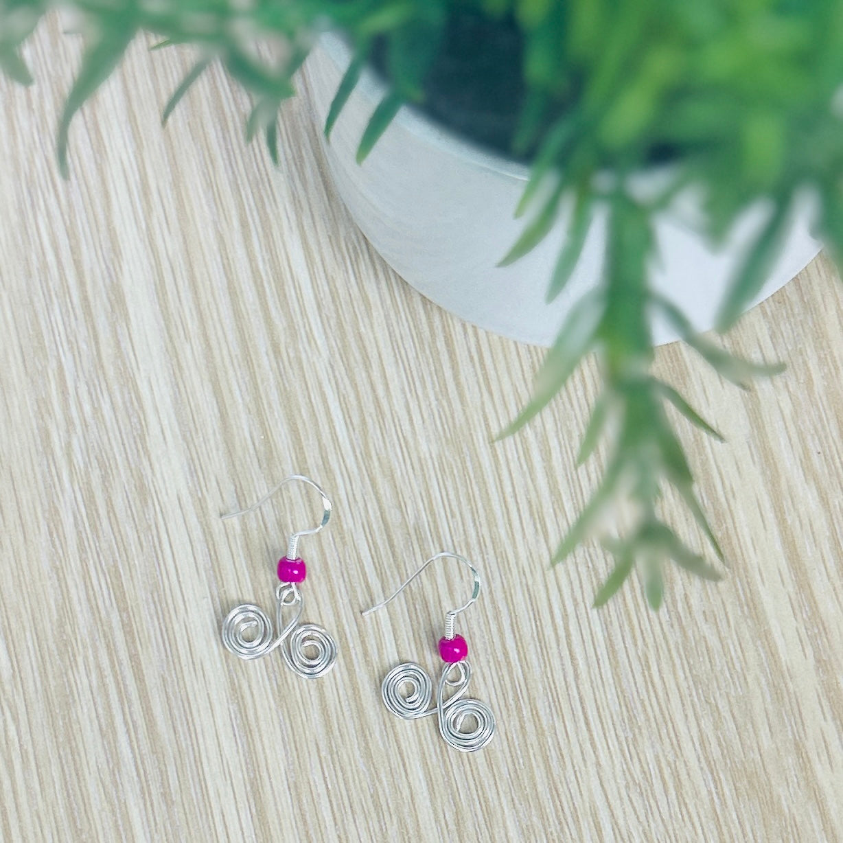 'Pinky' Cute wire swirls with repurposed Pony beads