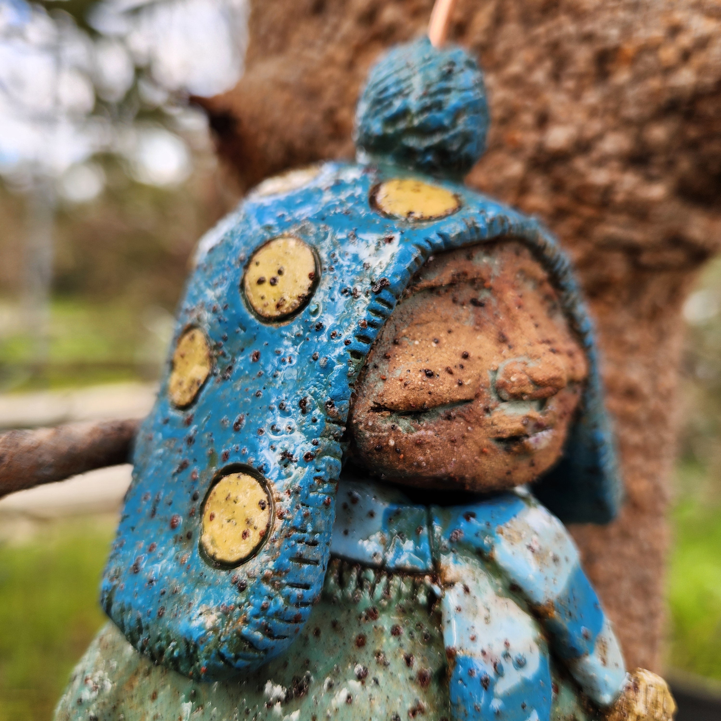 Clay windchime, little girl, bird