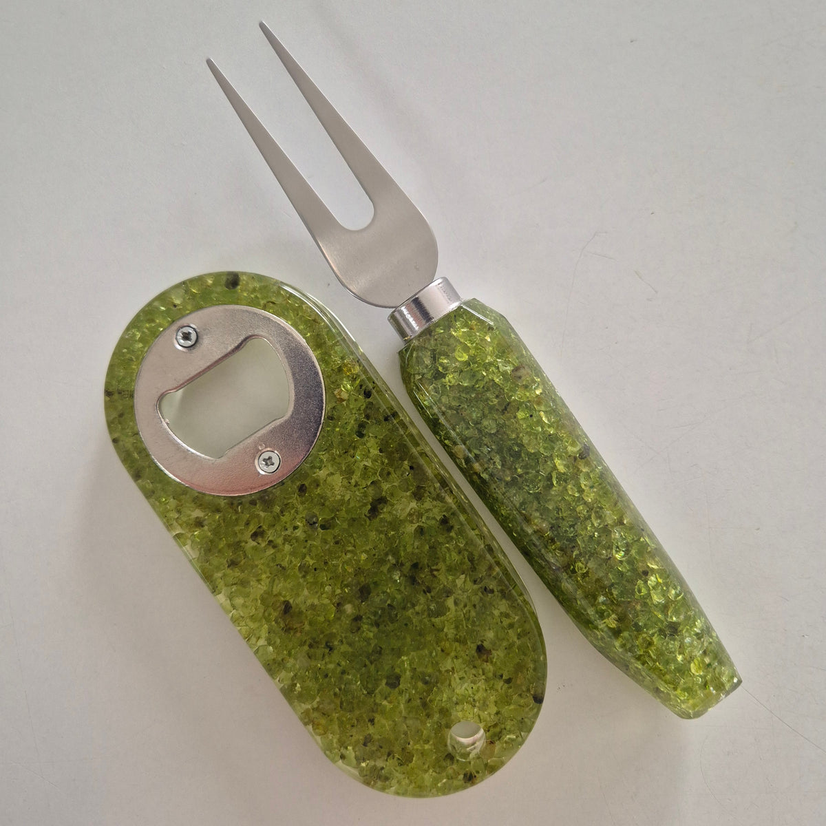 Resin bottle opener and cheese knife set with peridot