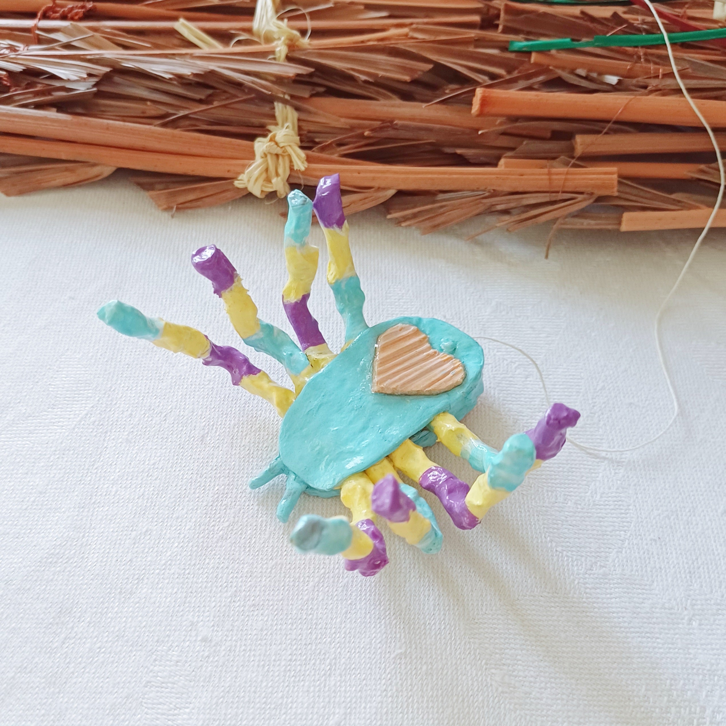 Happy palm spider blue purple yellow handmade Australia
