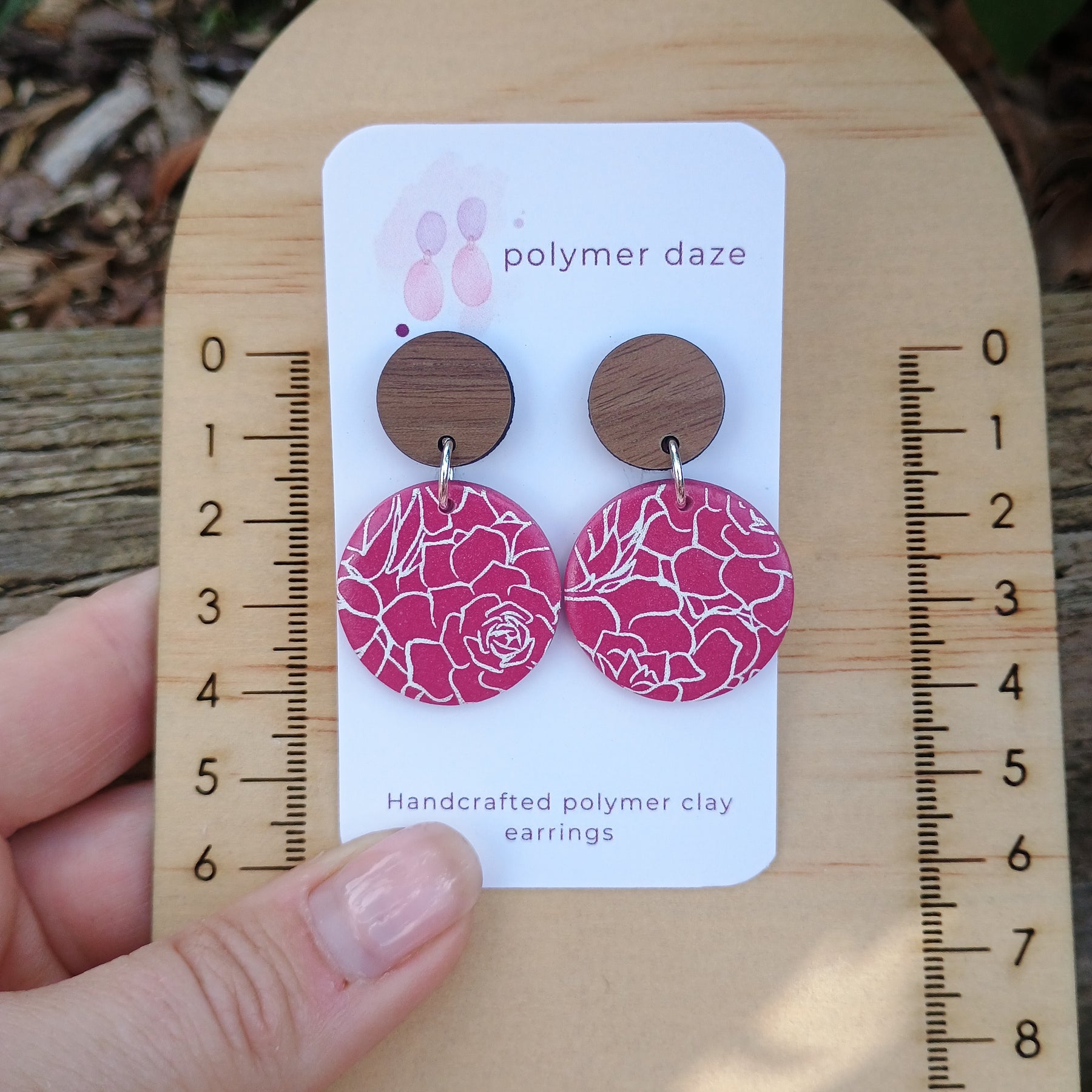 Plum florals with natural wood stud top
