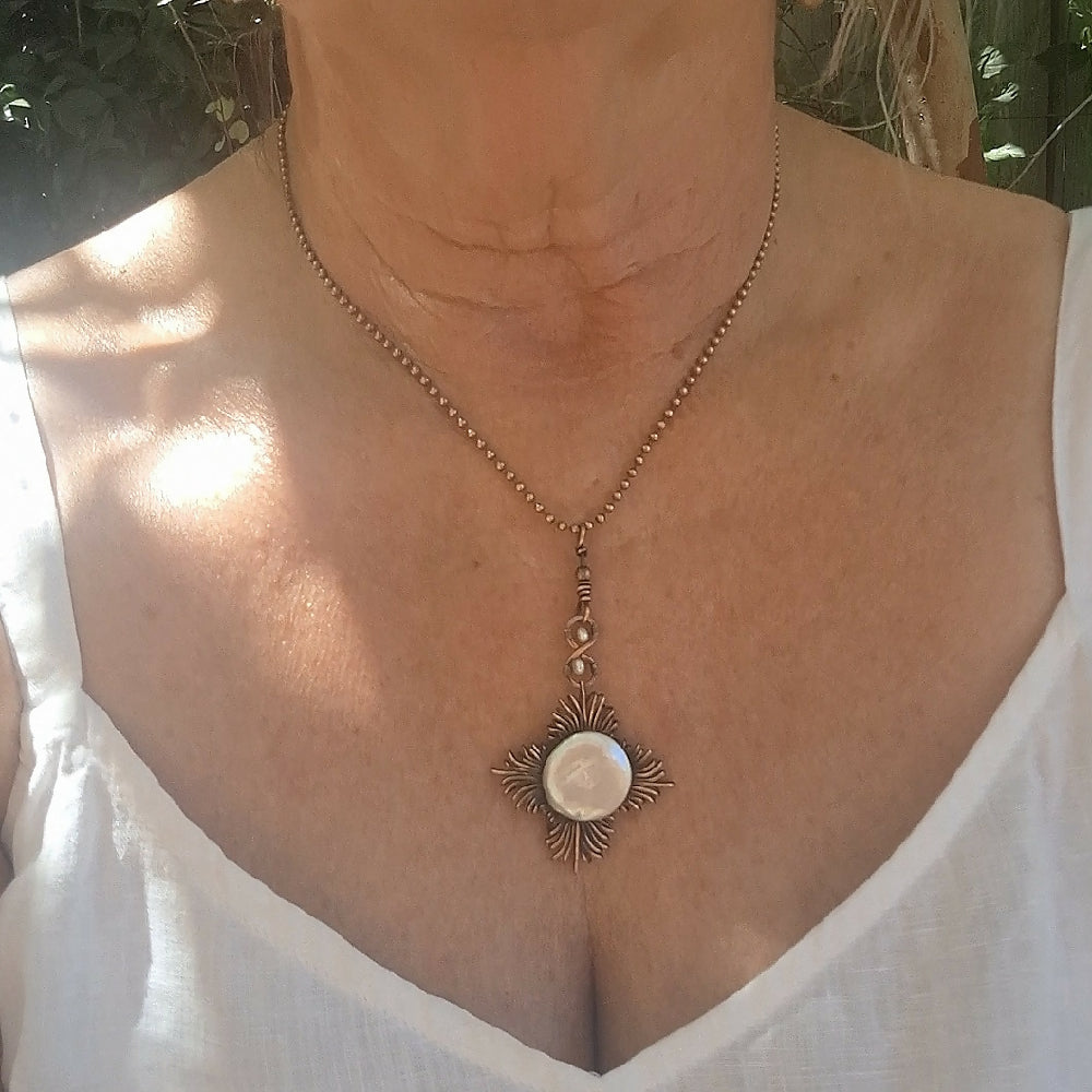 Pearl Sun pendant wearing