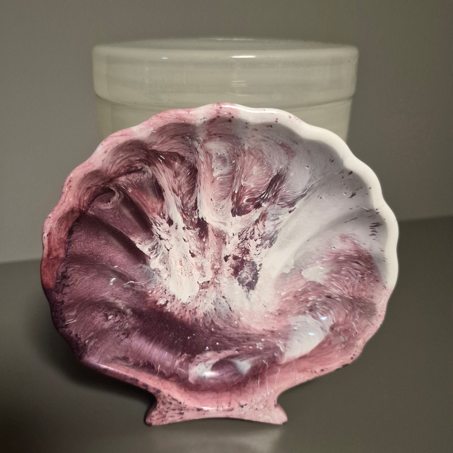 Pink and white shell dish.