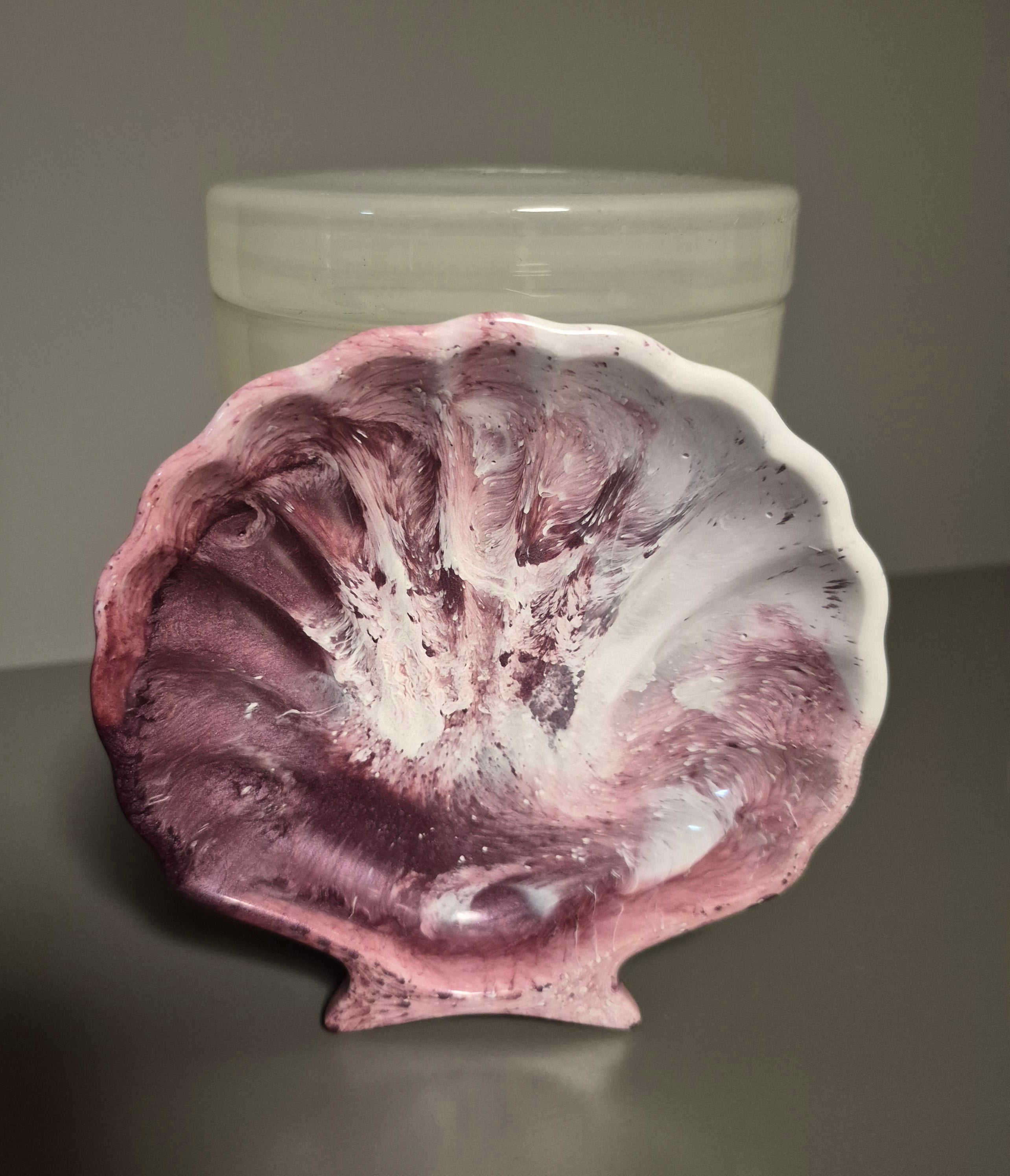 Pink and white shell dish.