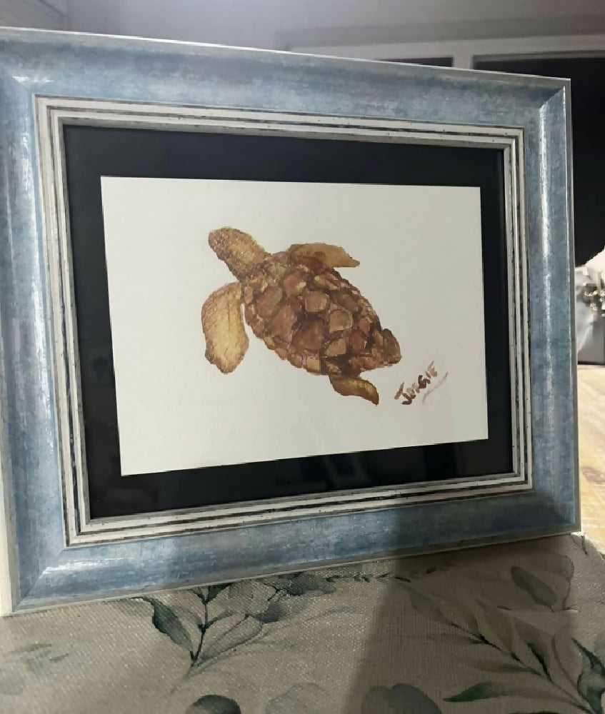 Watercolor of a sea turtle , titled The Swim ,