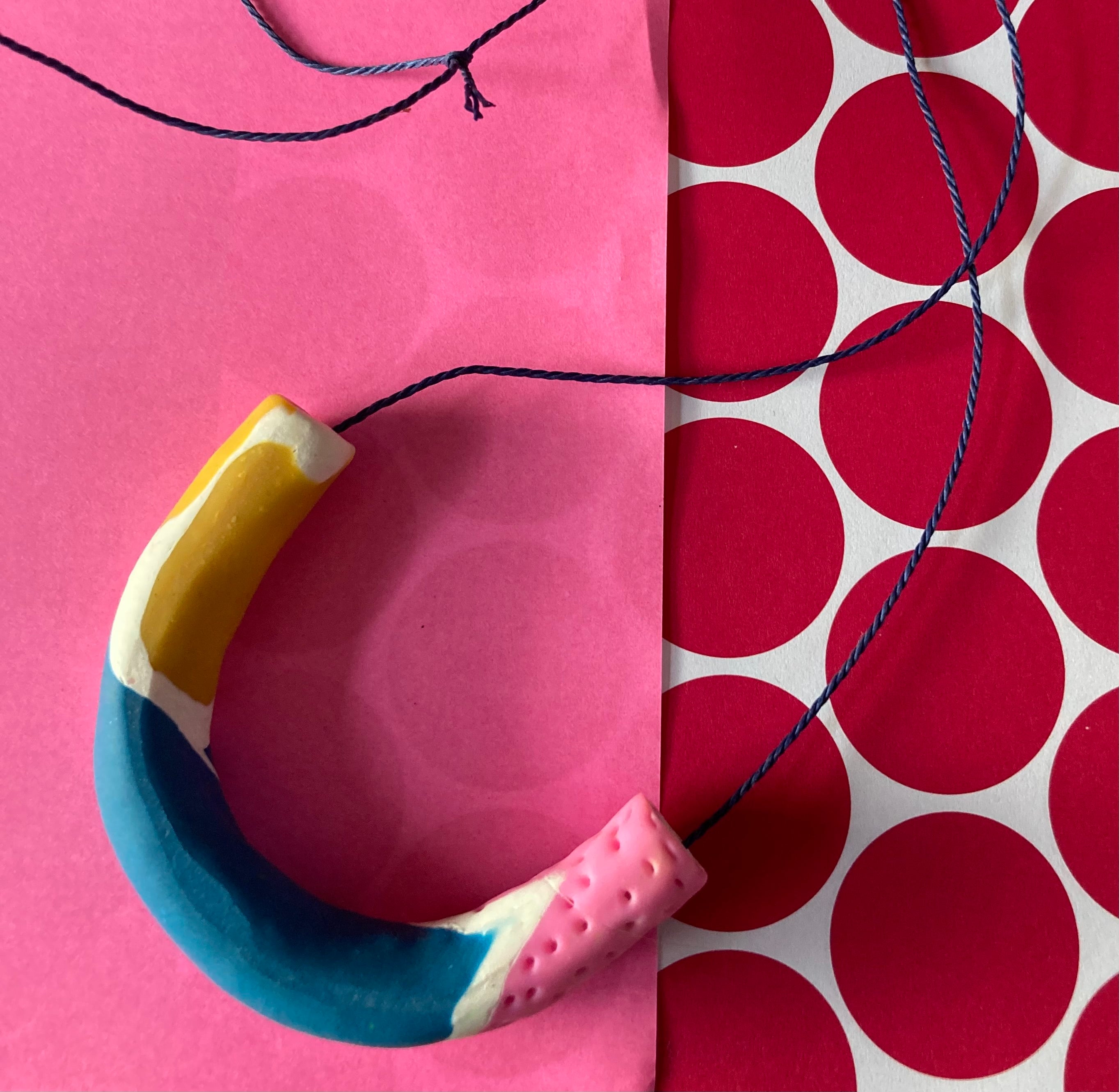 Polymer clay arch necklace