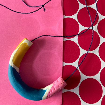 Polymer clay arch necklace