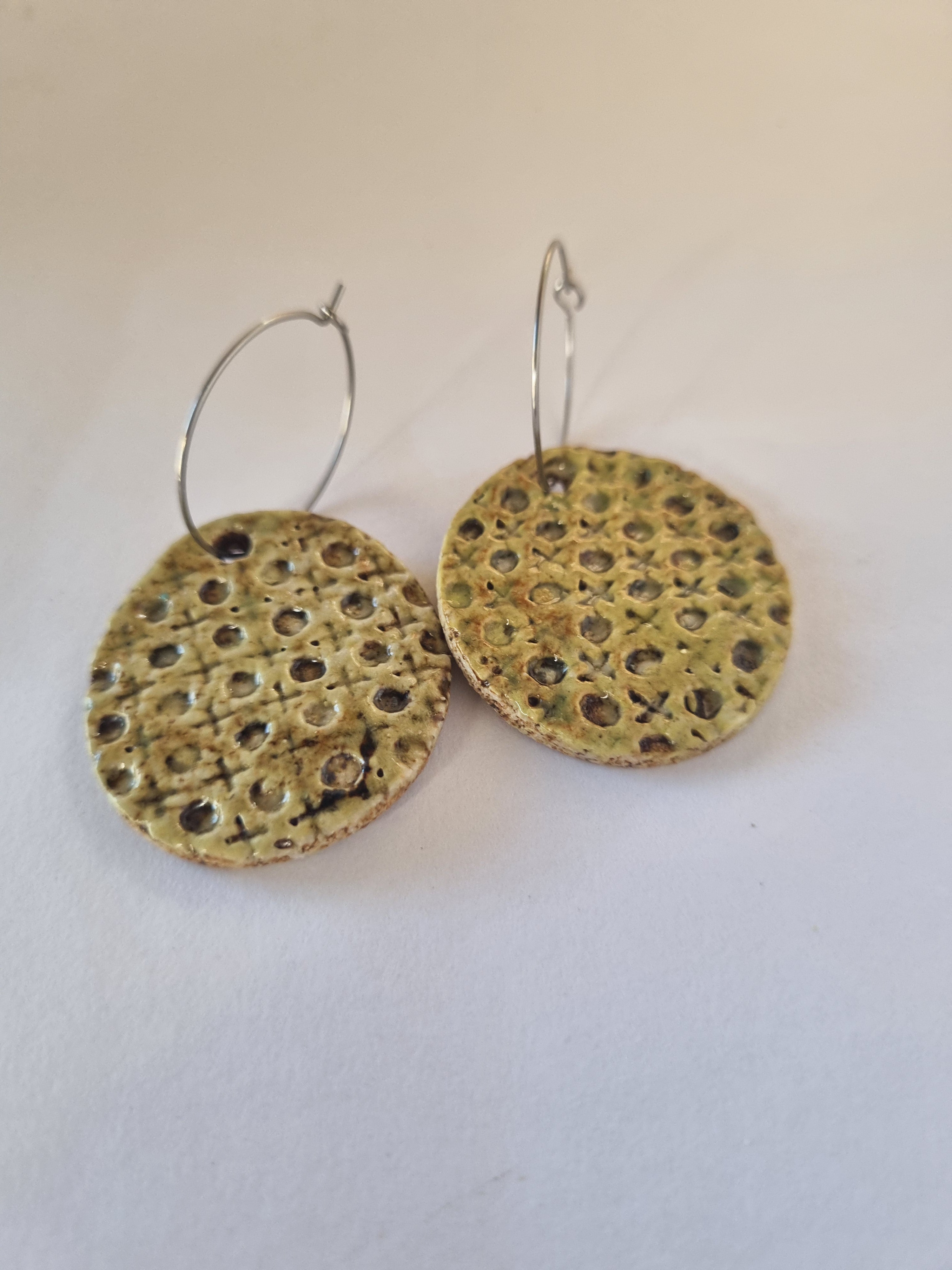 Handmade Stoneware Ceramic Earrings, muted green lattice multi-coloured, 35mm diameter, pierced ears