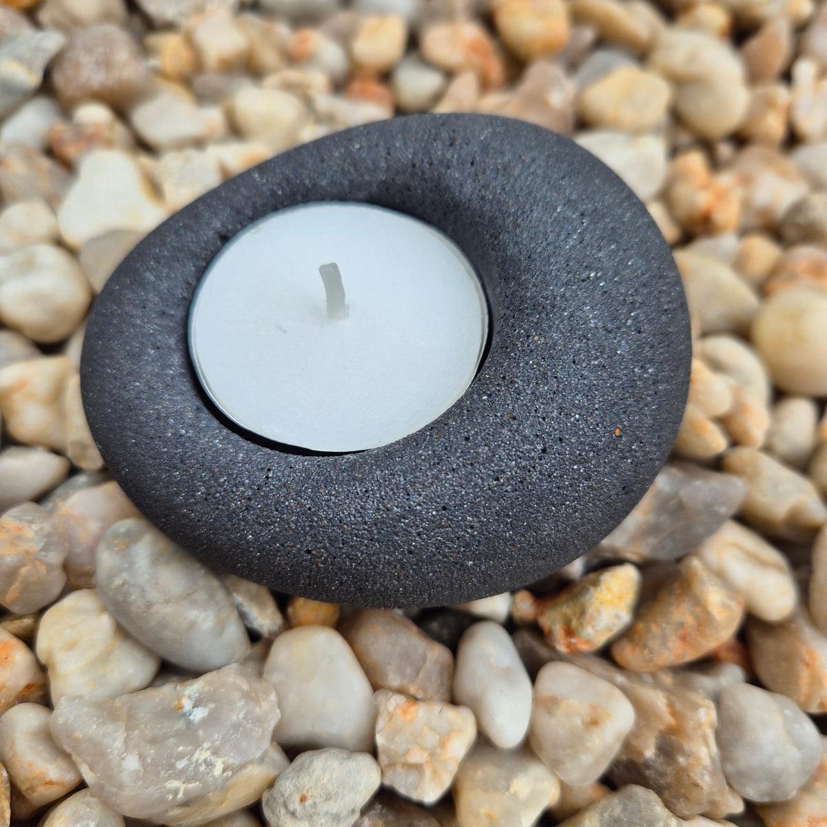 Black eco-stone pebble shaped tealight candle holder