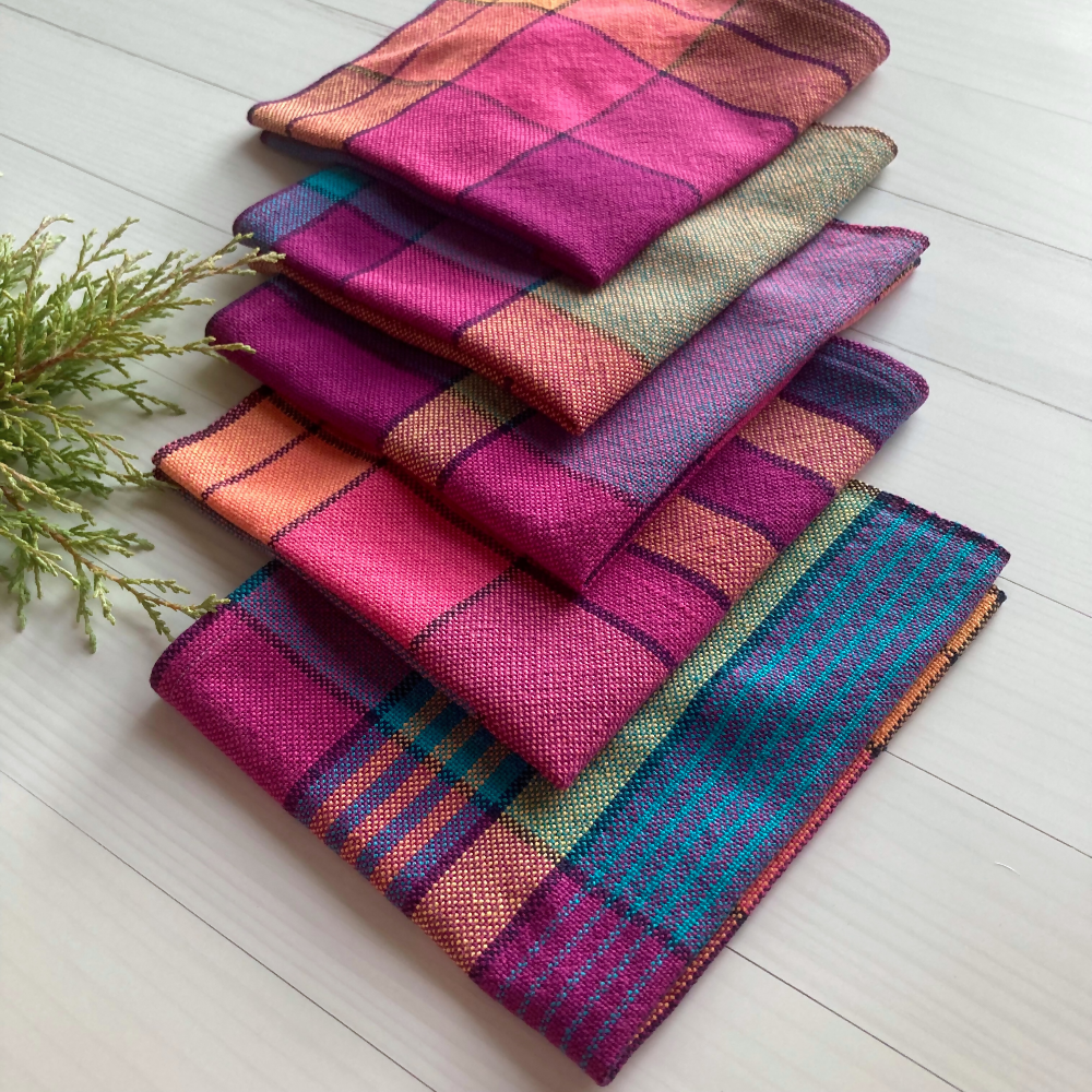 Five-napkins-folded-handwoven-entangled-happiness-handwovens