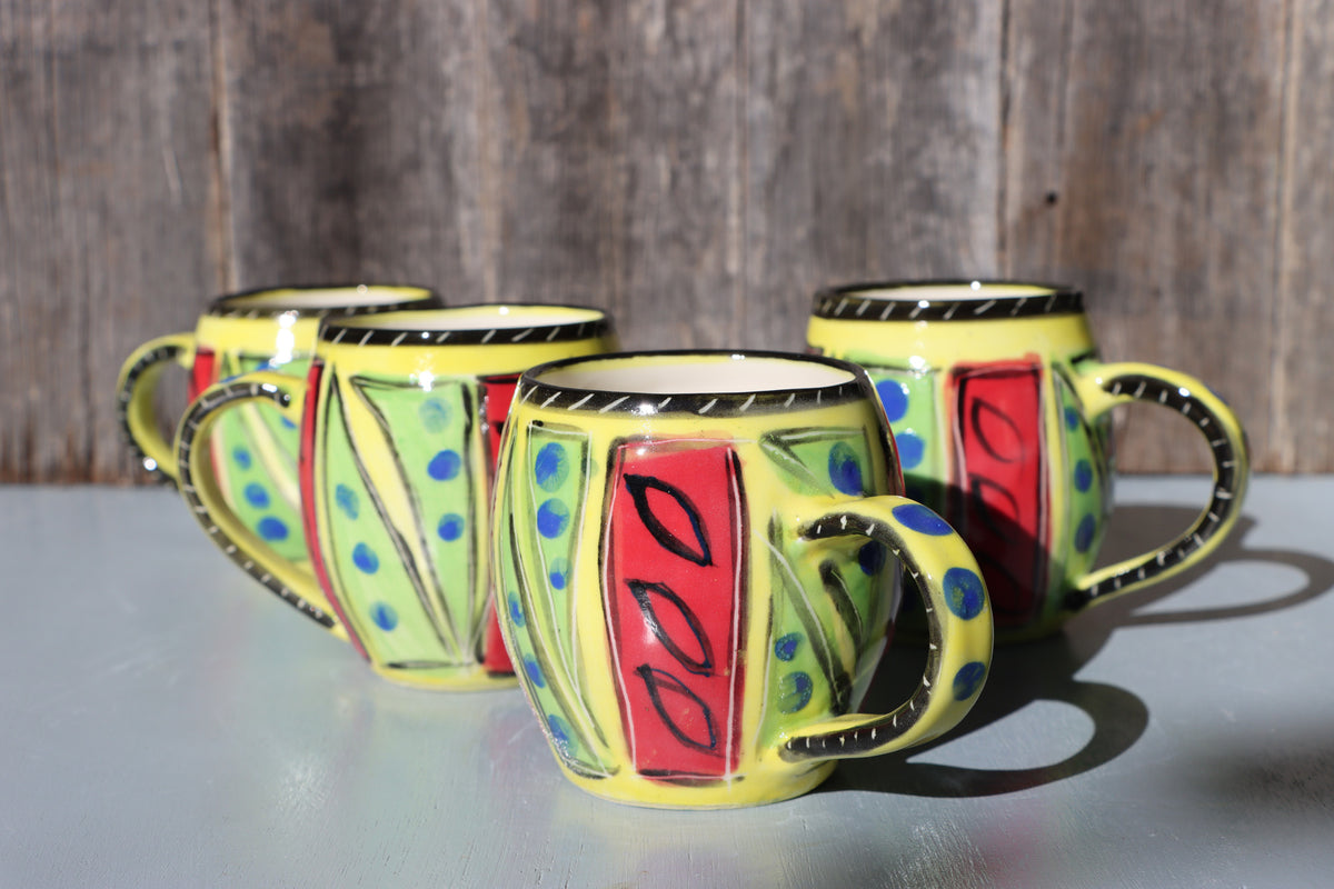 Hand-Painted Mug: Abstract yellow, red, green, black and blue mid-fire stoneware
