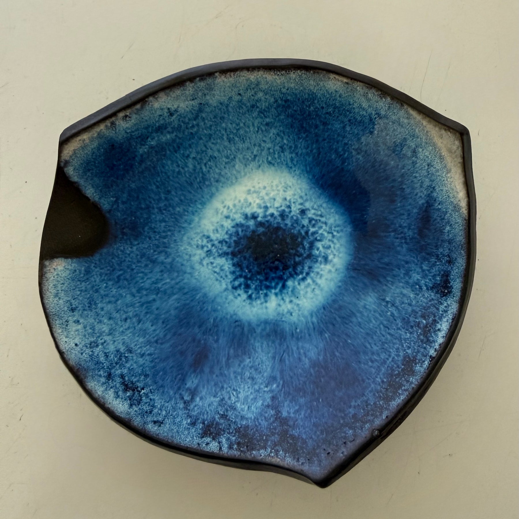 Small asymetrical blue dish