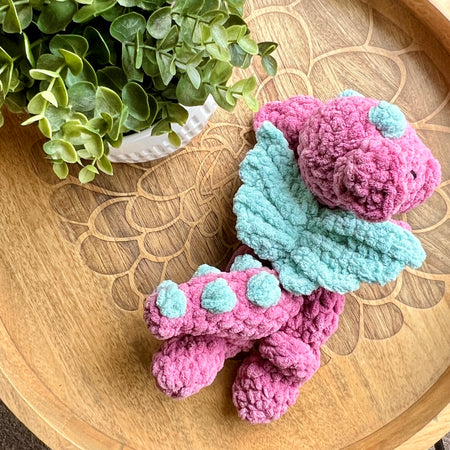 Handmade crochet Mini Dragon modern lovey with knotted legs.