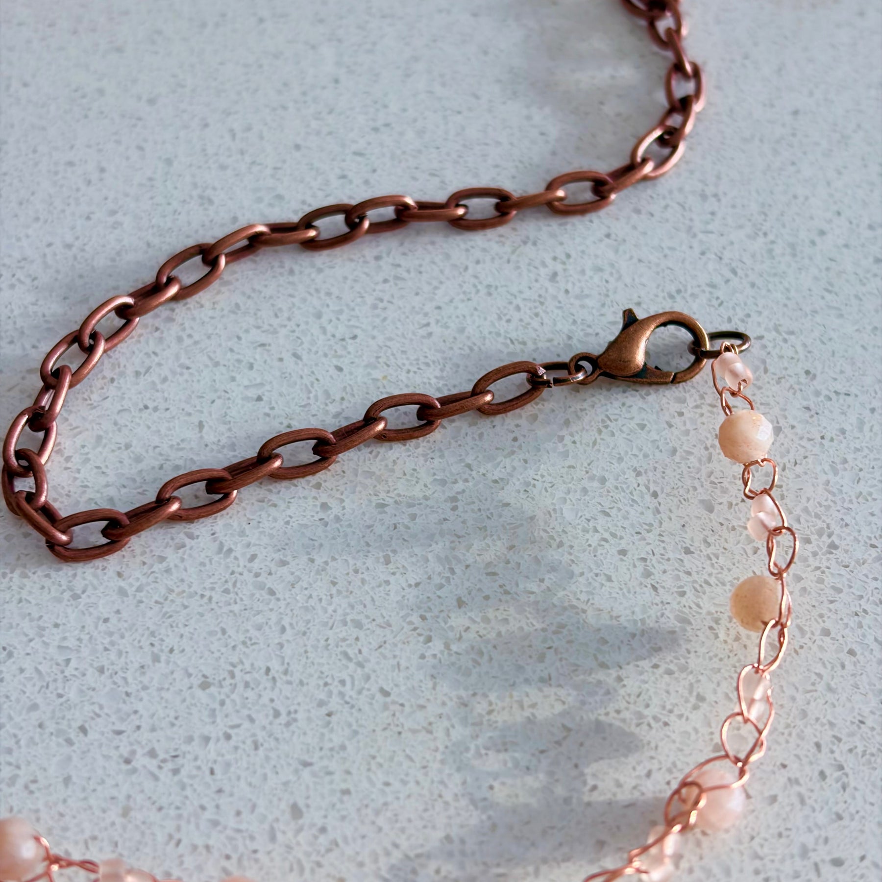 Moon Twist-peach moonstone and copper crochet necklace