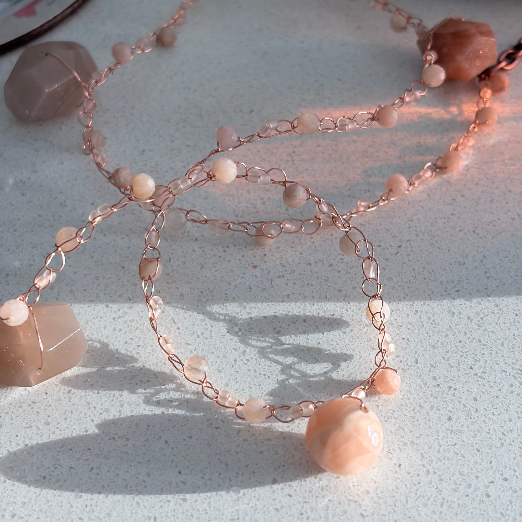 Moon Twist-peach moonstone and copper crochet necklace
