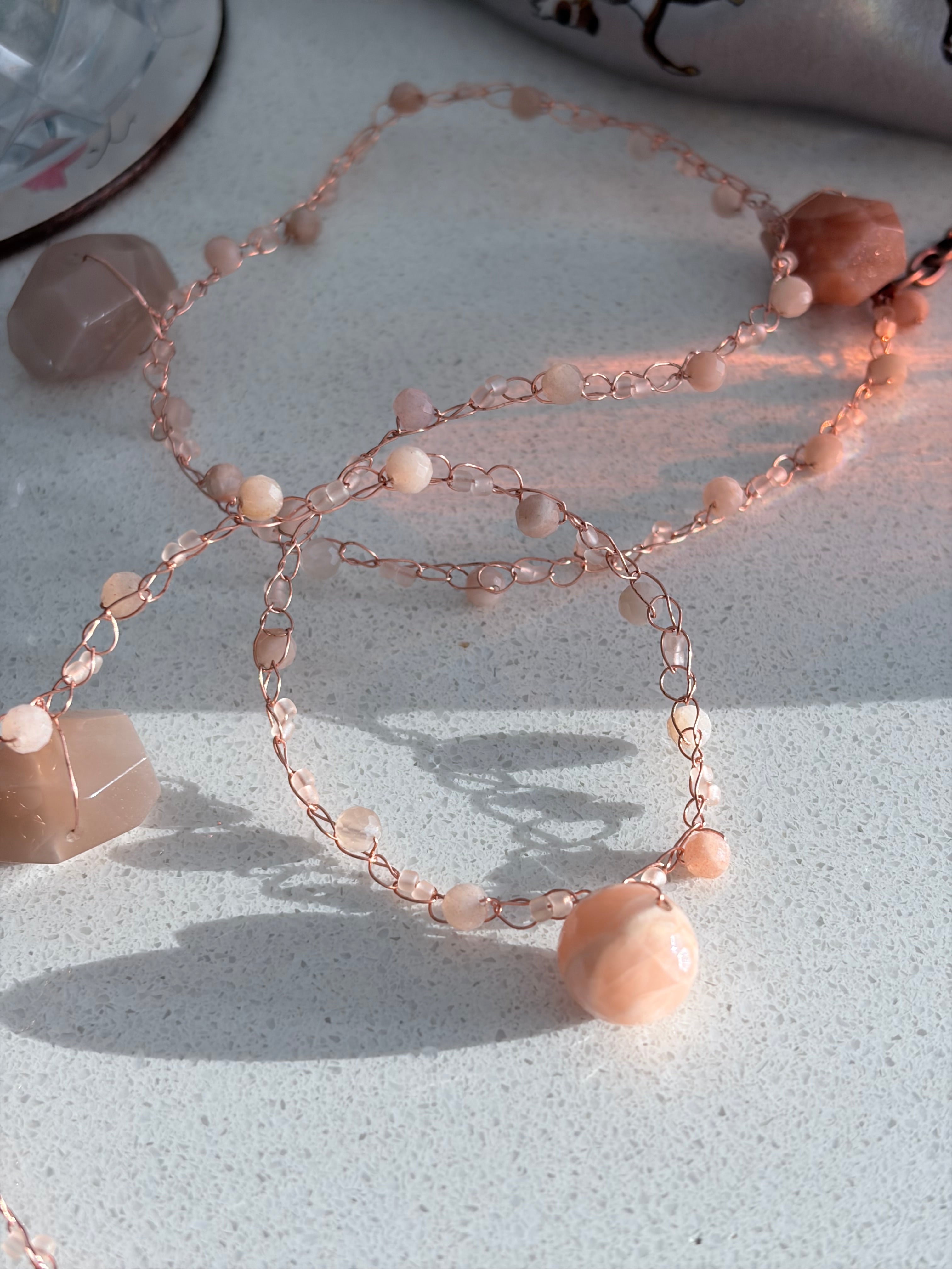 Moon Twist-peach moonstone and copper crochet necklace