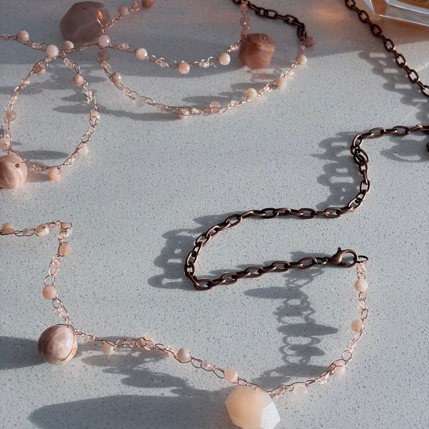 Moon Twist-peach moonstone and copper crochet necklace