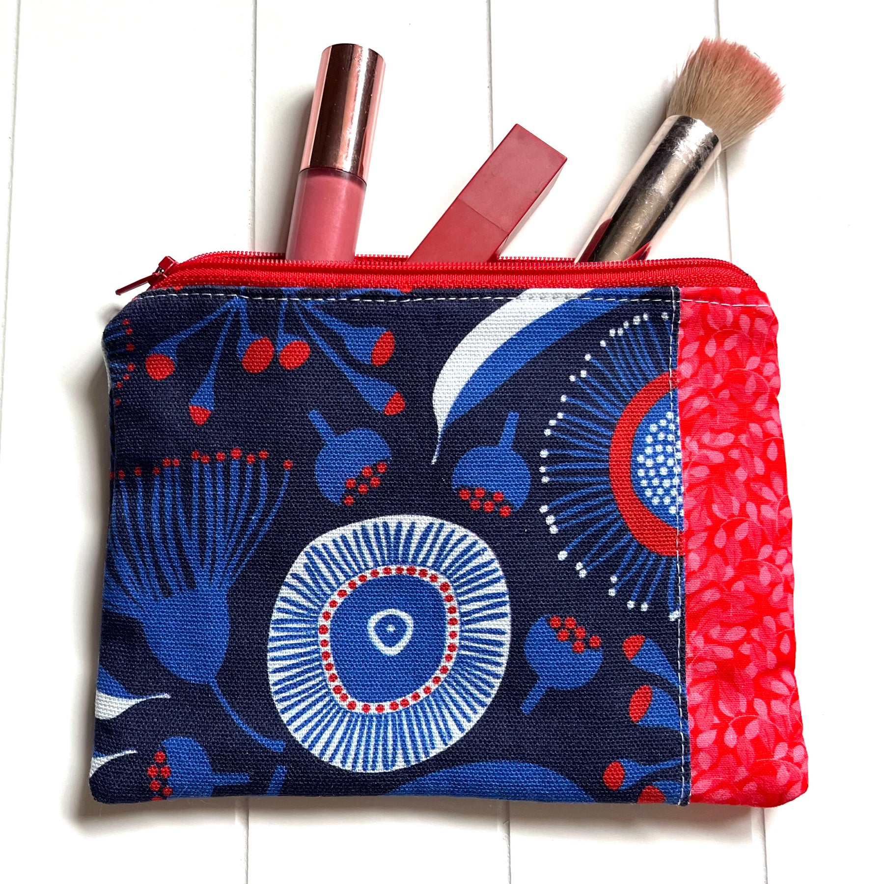 Red and blue gum blossom purse