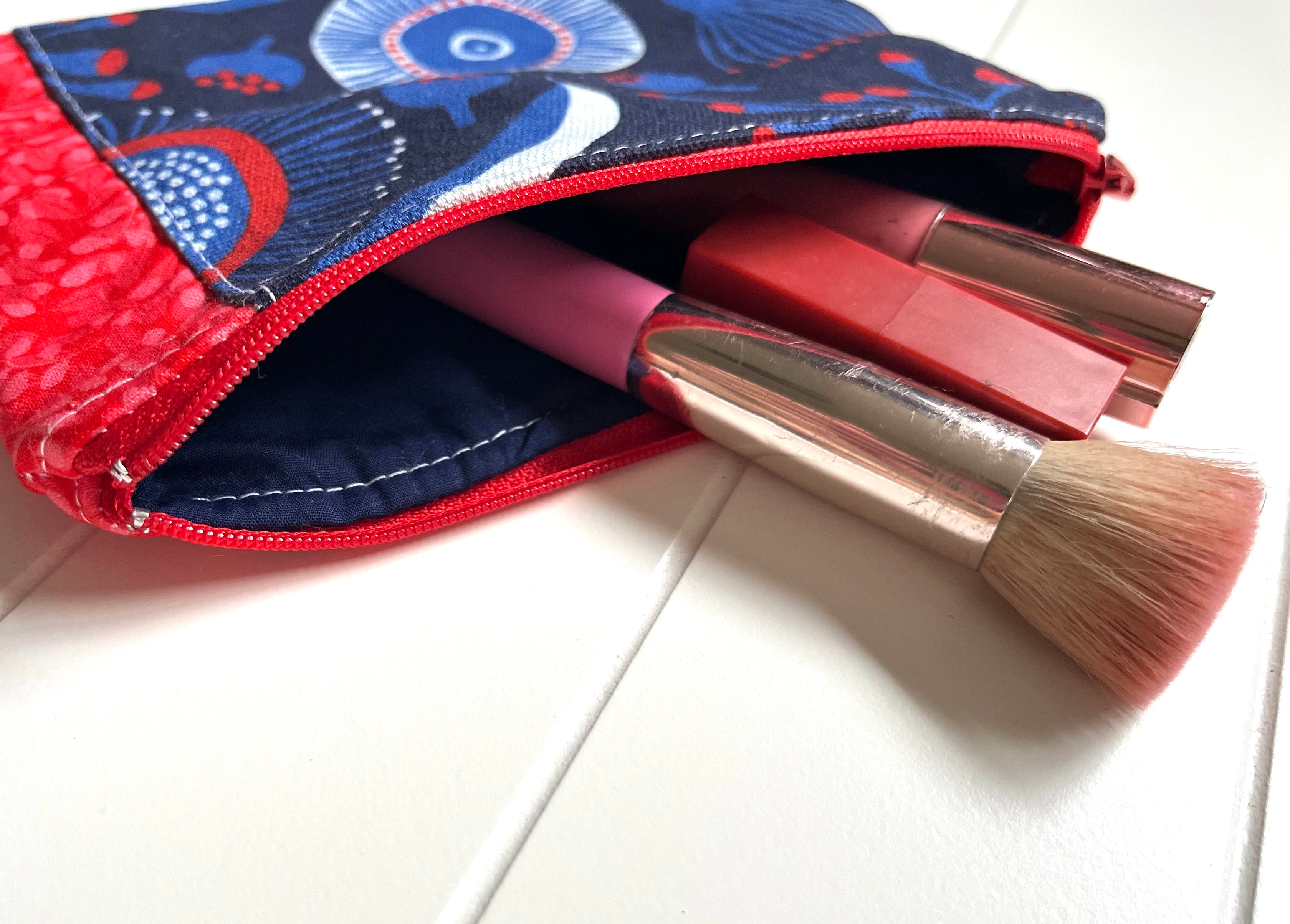 Red and blue gum blossom purse