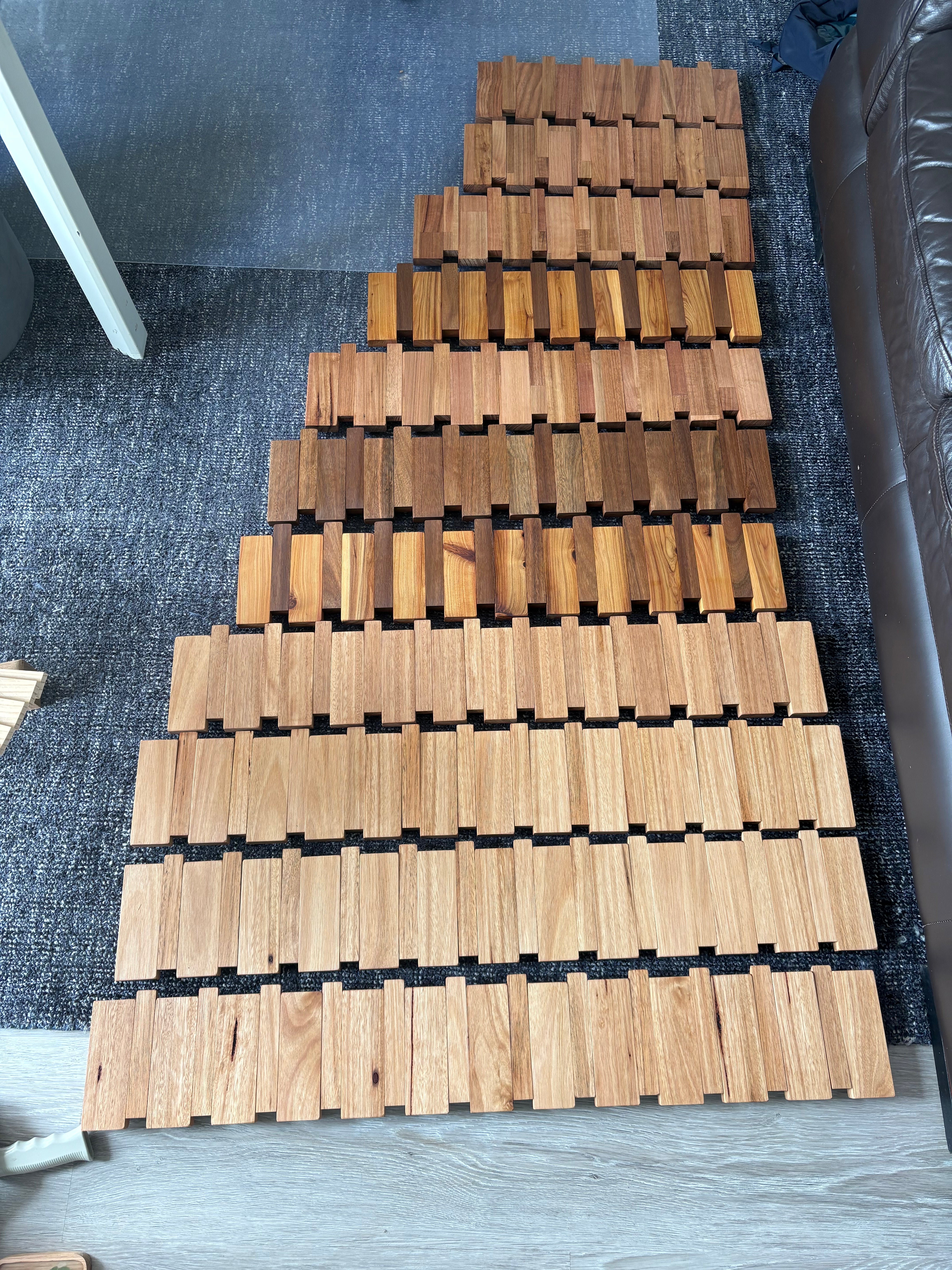 Two tone piano style coatrack