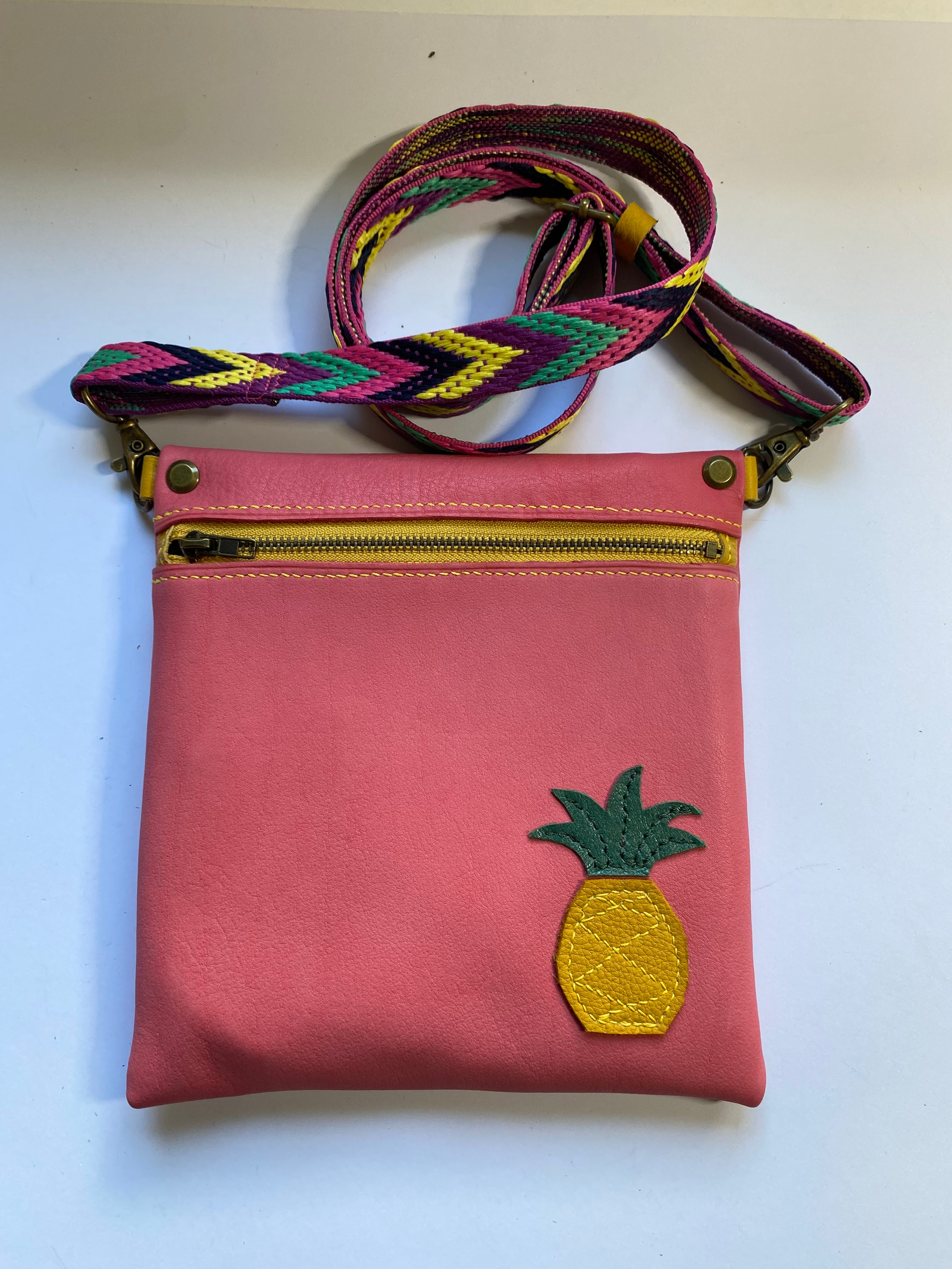 Leather crossbody bag with pineapple motif