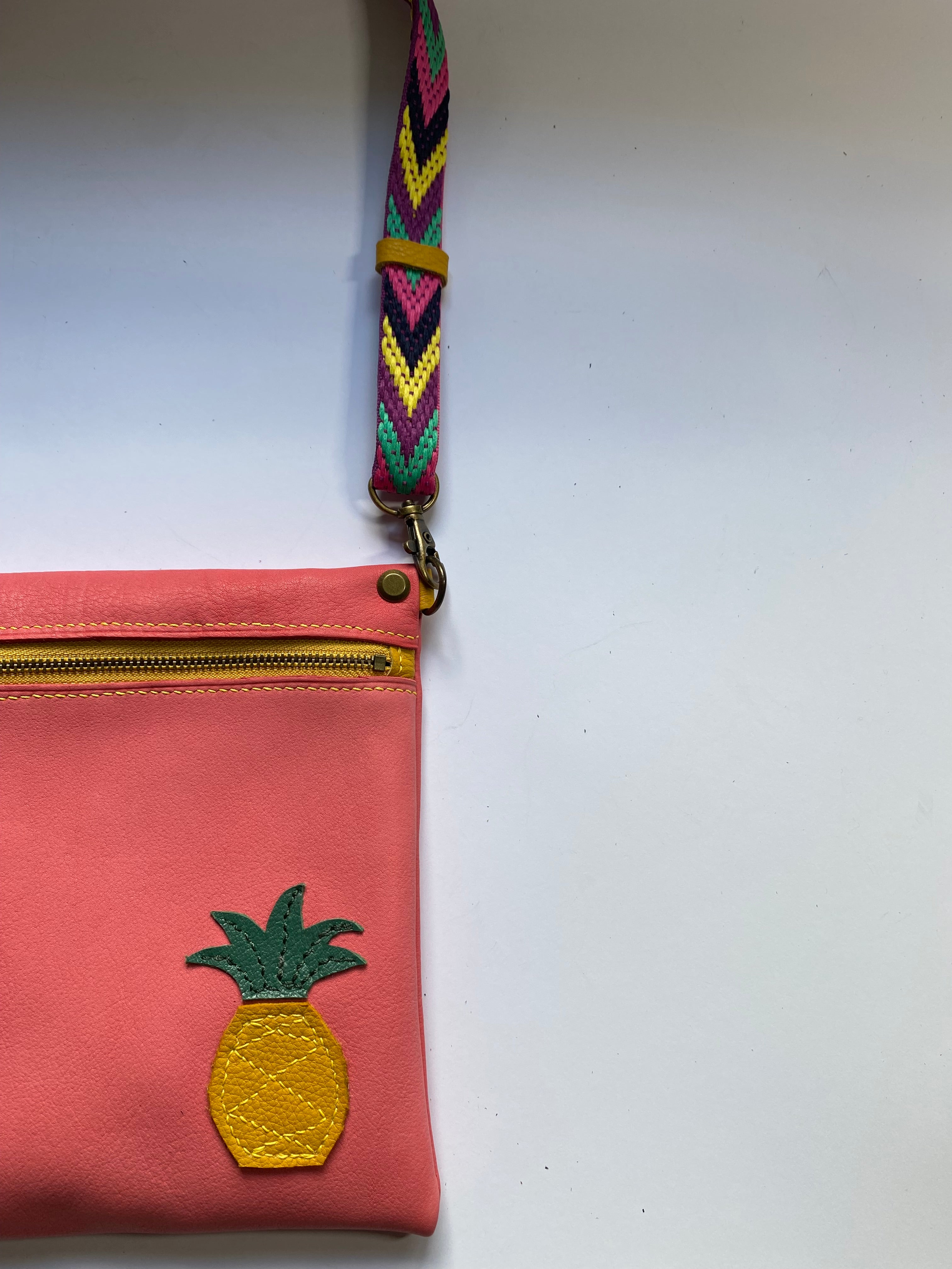 Leather crossbody bag with pineapple motif