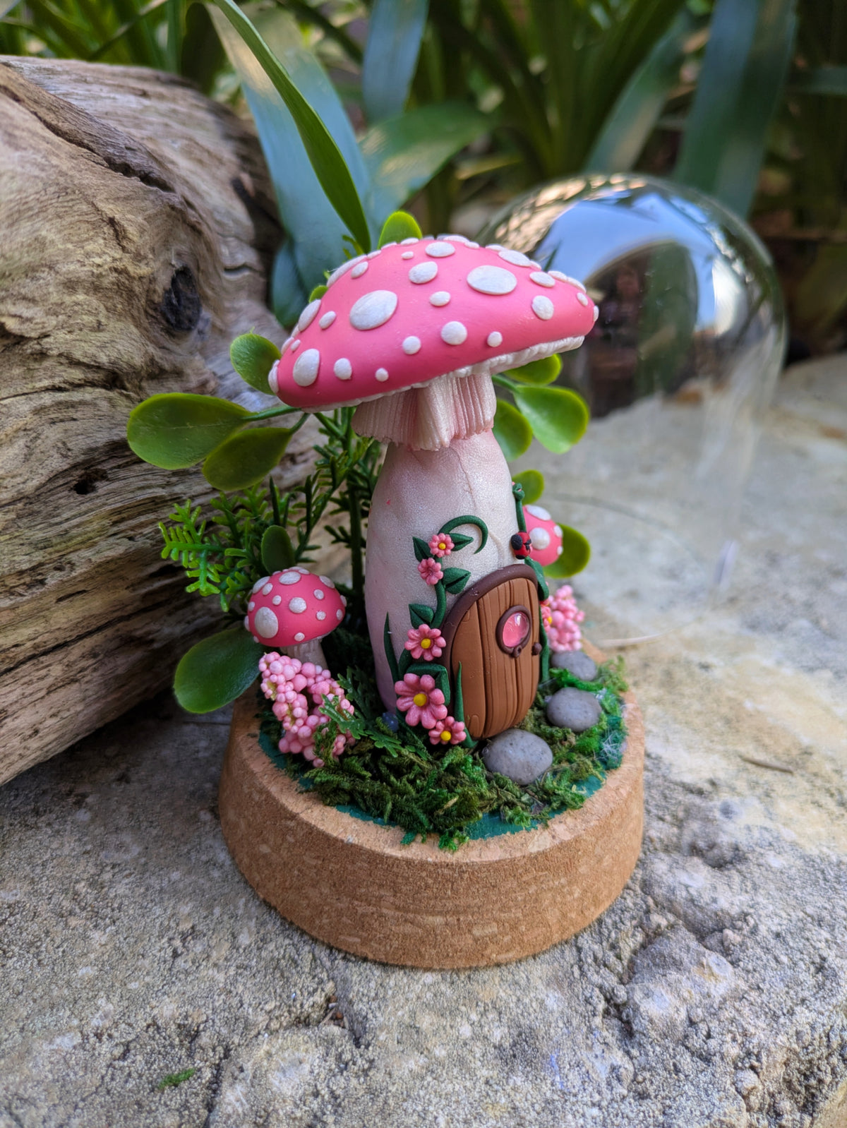 Pink Fairy Mushroom Houses in glass domes