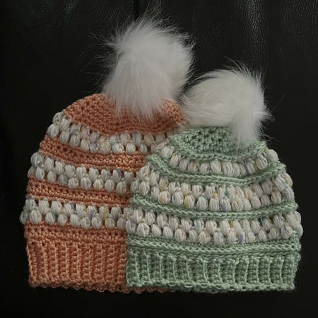 Children’s textured beanies with detachable pompom