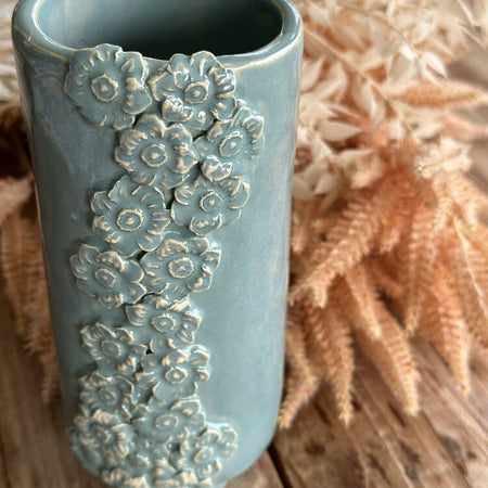 Vase with trailling flower design