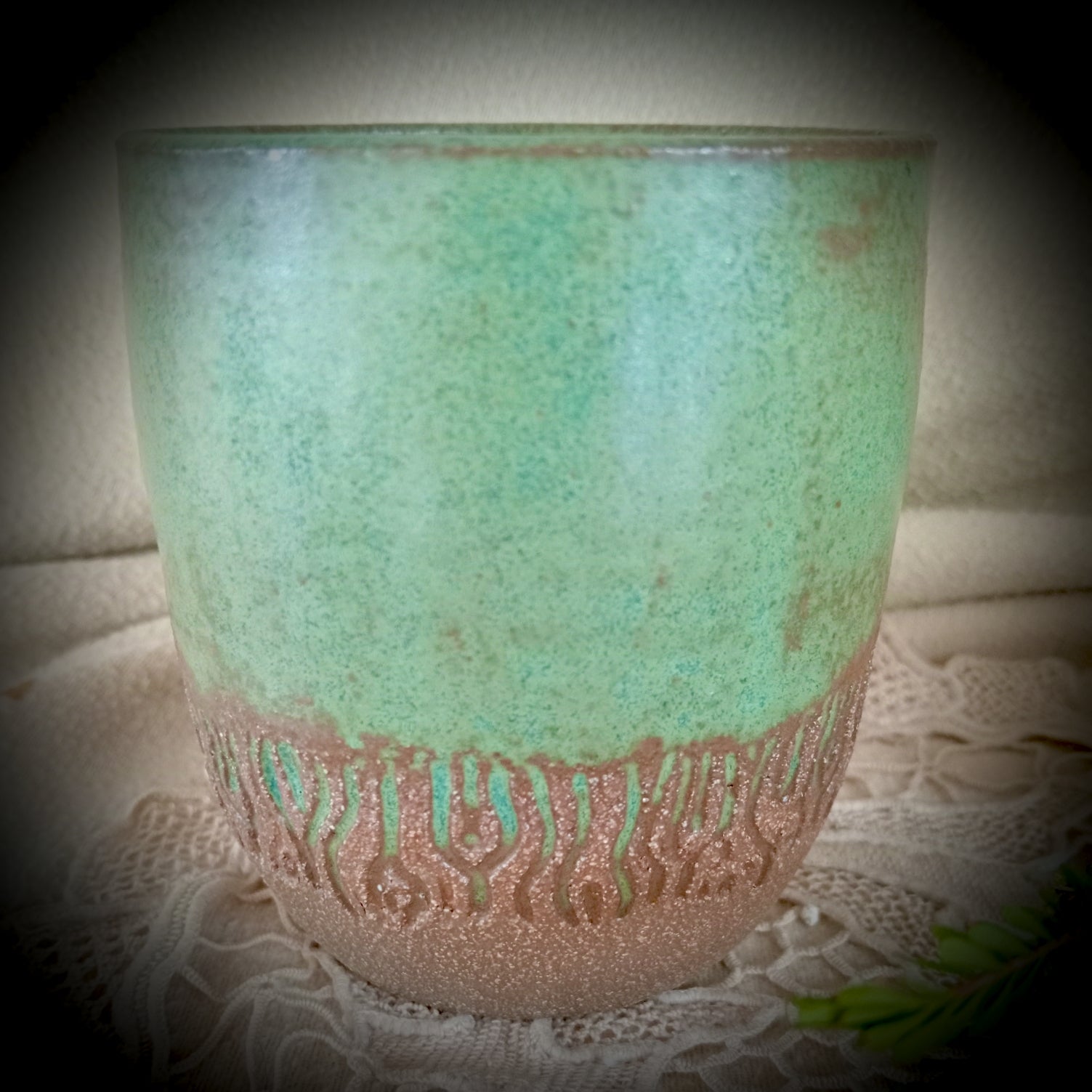 Ceramic tumbler in rustic teal green and rich brown