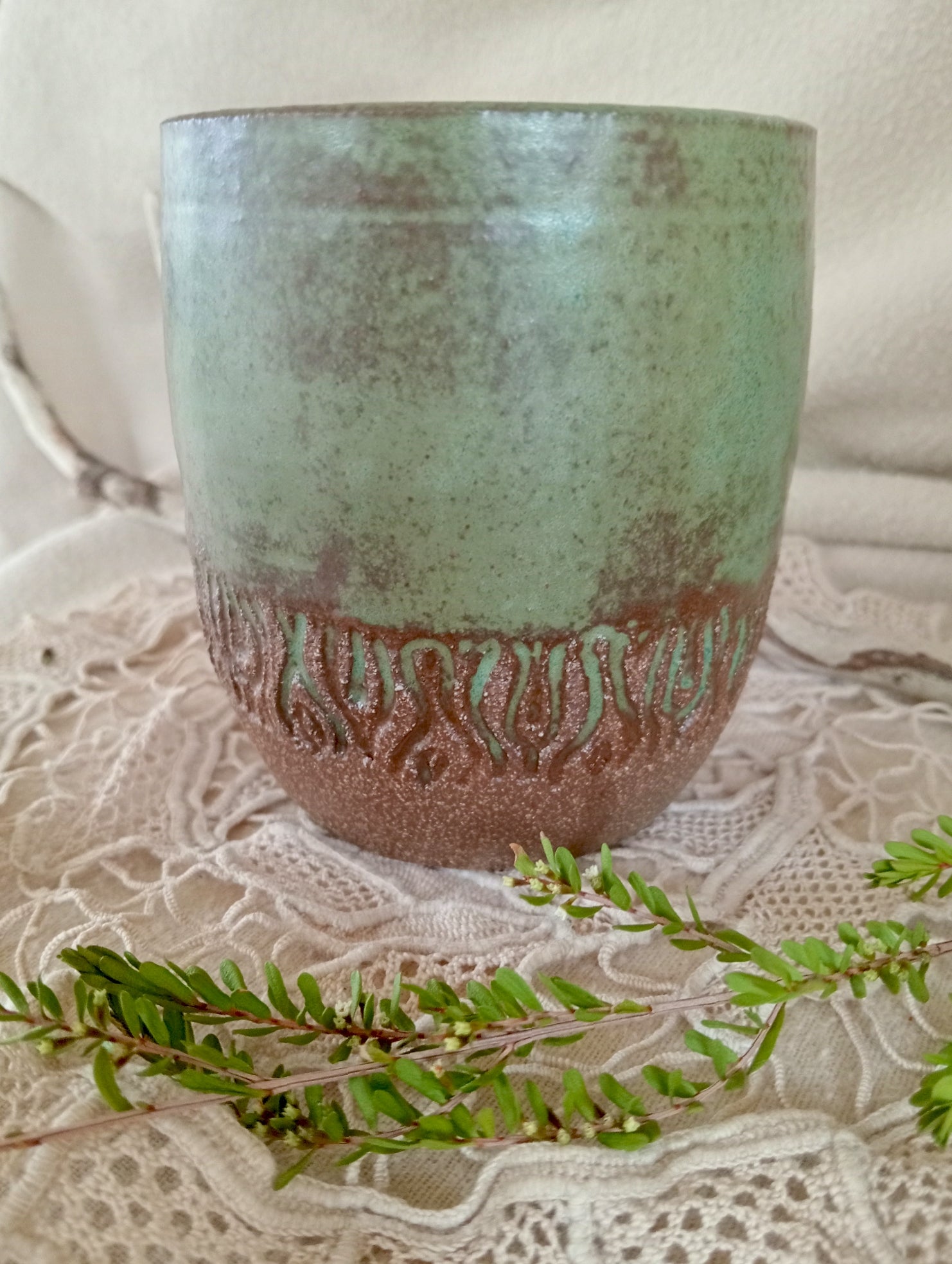 Ceramic tumbler in rustic teal green and rich brown