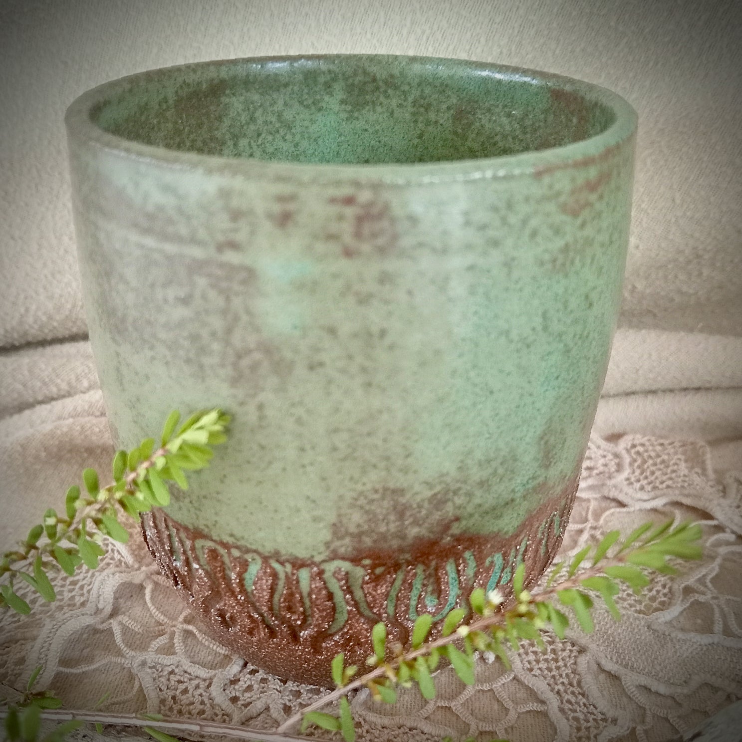 Ceramic tumbler in rustic teal green and rich brown