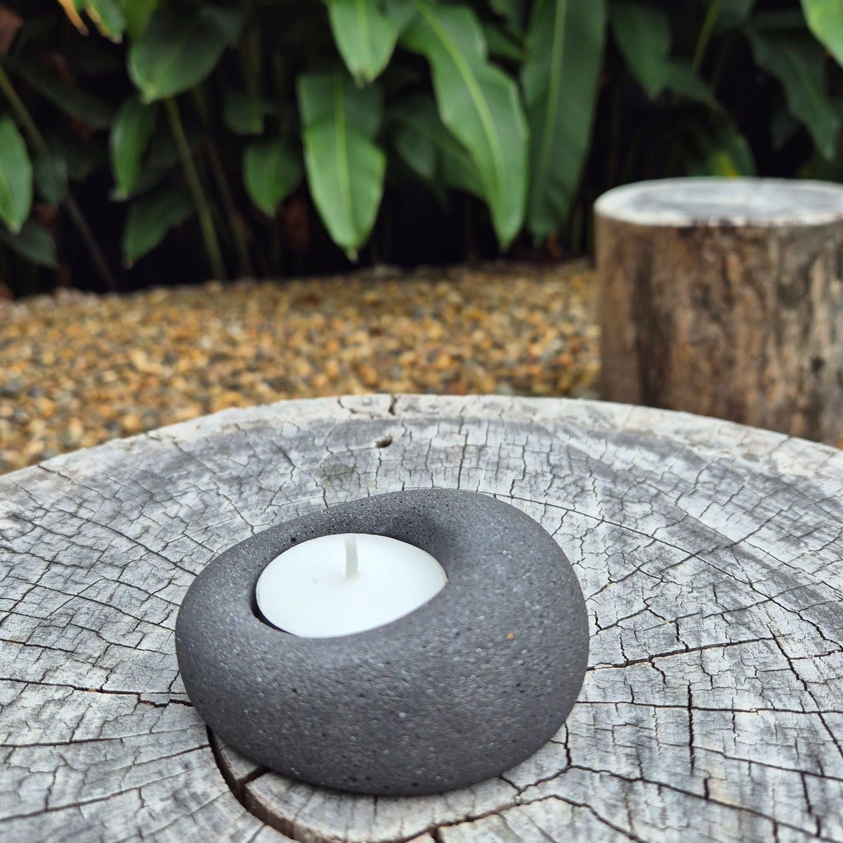 Black eco-stone pebble shaped tealight candle holder