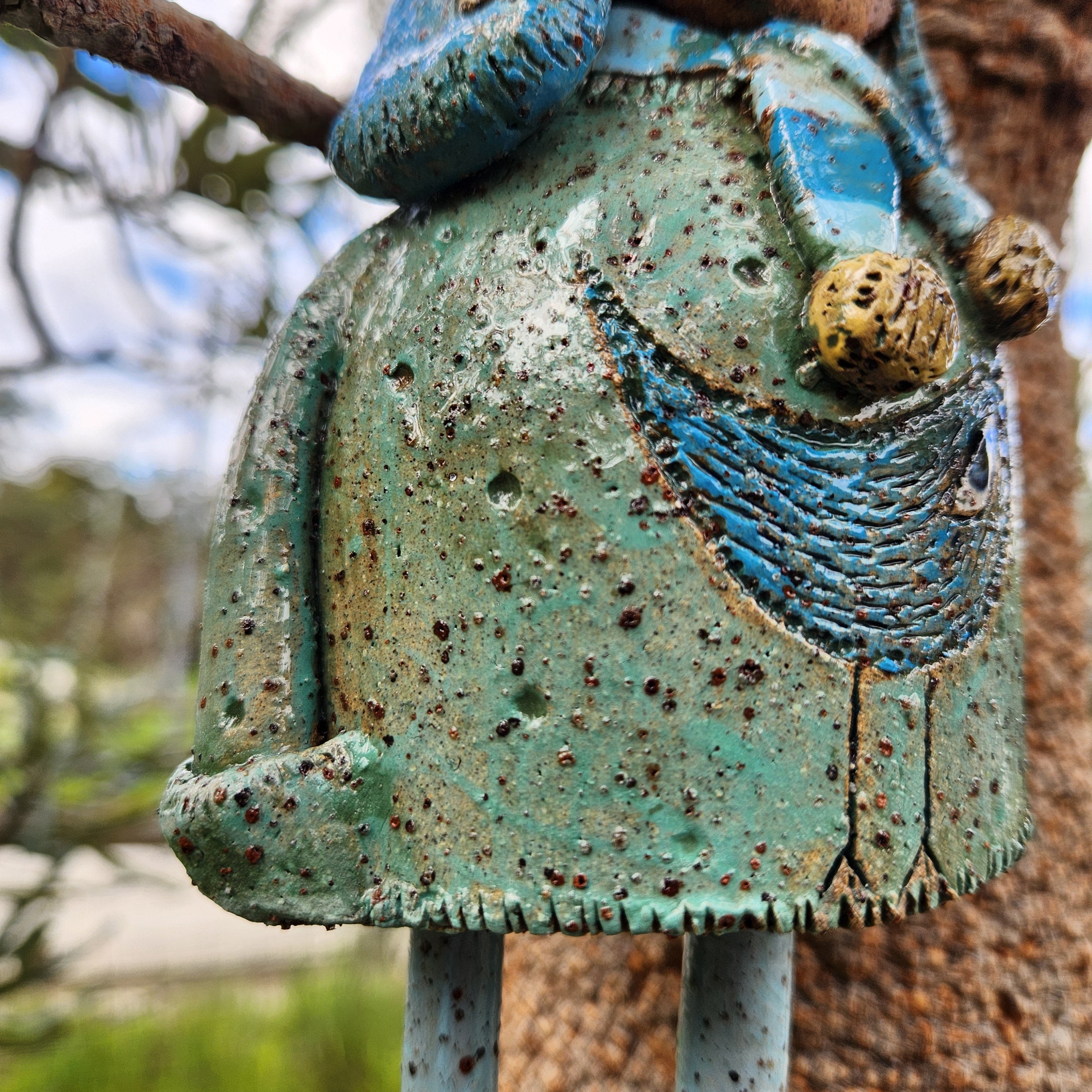 Clay windchime, little girl, bird
