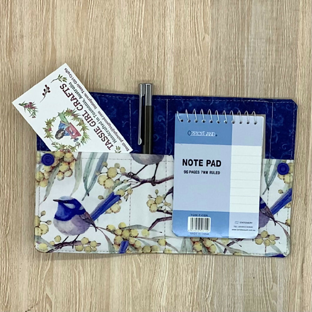 Wrens refillable fabric pocket notepad cover with snap closure. Incl. book and pen.
