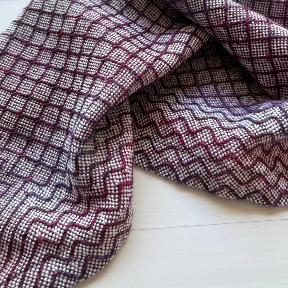 Closeup-scrunched-purple-handwoven-baby-blanket